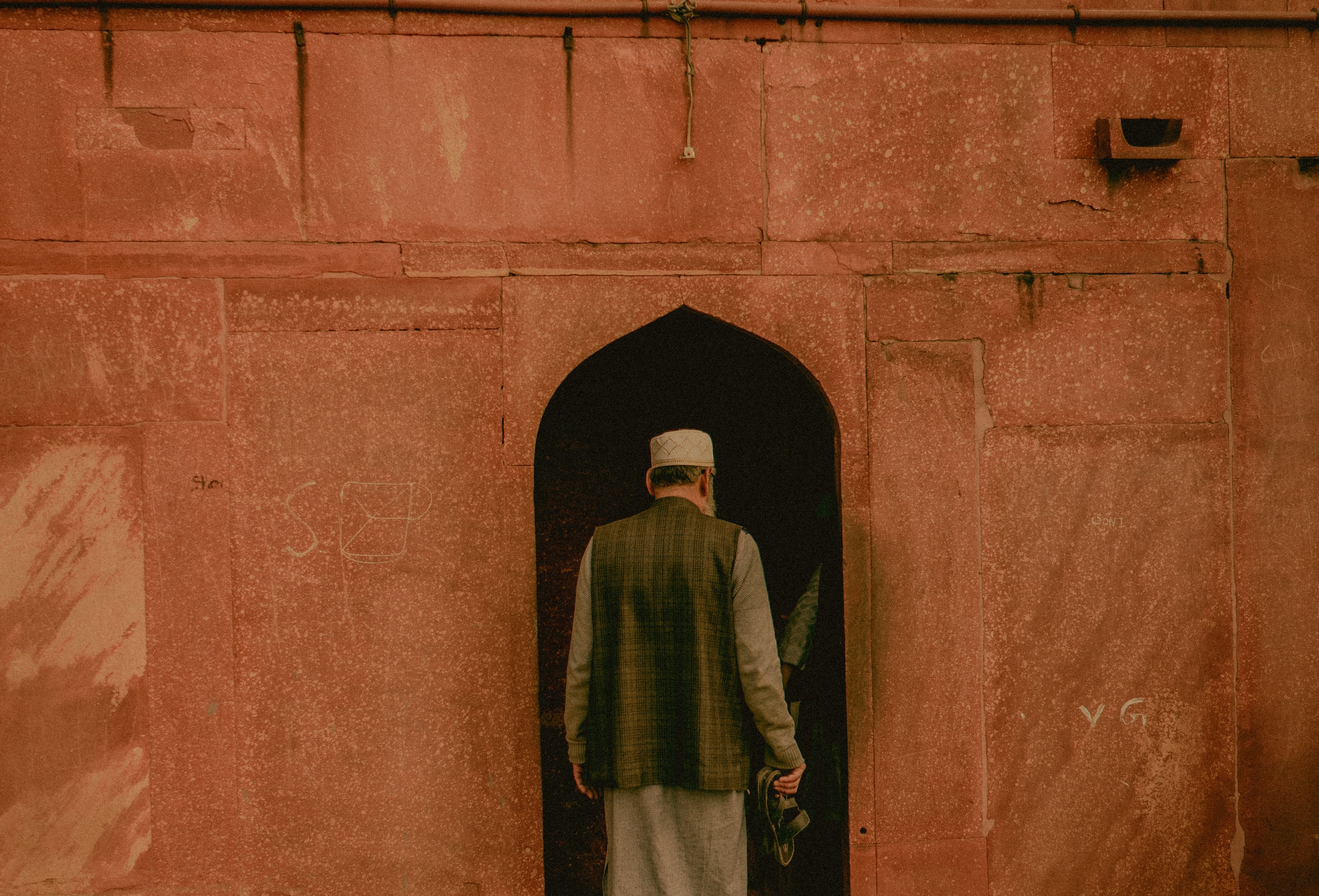 Man entering Jama Masjid Delhi